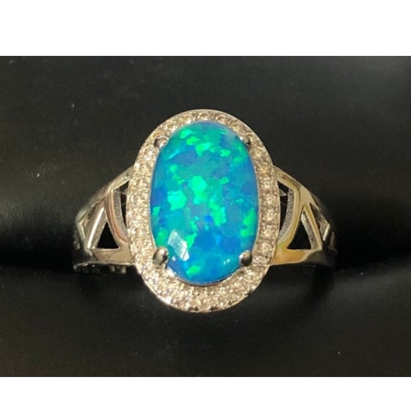 Jewelry - New Oval 925 Lab-Created Blue Opal Ring size 5